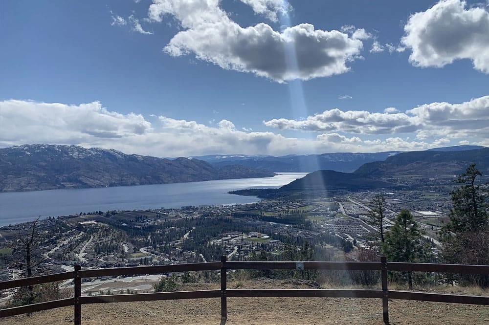 A stunning vantage point atop Mount Boucherie offers a wide-angle view of West Kelowna, the lake, and the surrounding mountain landscape.